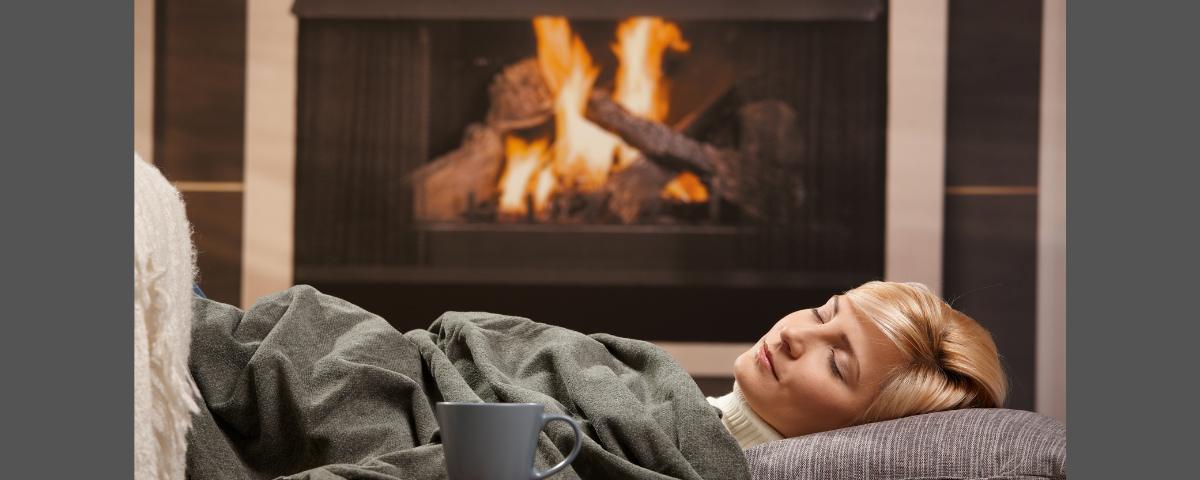 Winter solstice. Sleeping next to fireplace.