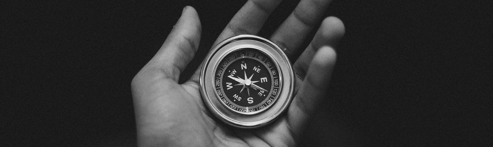 compass on an open palm