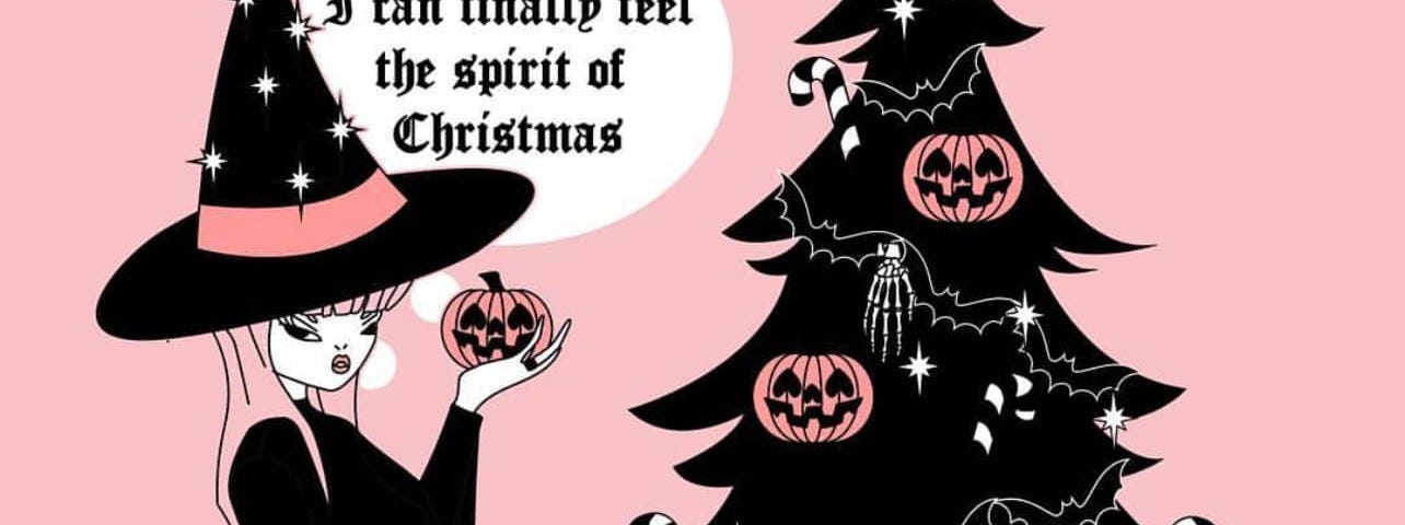 Spooky female witch with hat holds Halloween Jack-O-Lantern pumpkin in front of black Christmas tree with more Jack-O-Lanterns, skeleton hands, and candy canes decorating and small coffin in front.