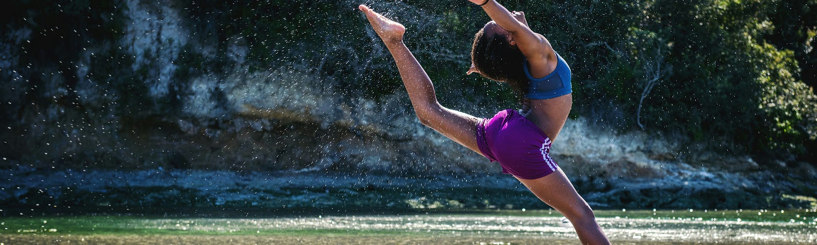 Woman jumping in the water