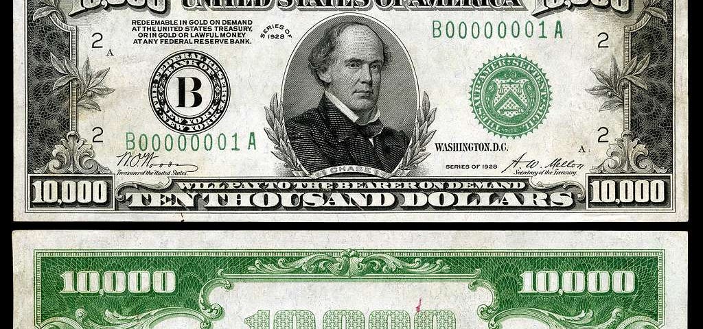 The front and back of the $10,000 federal reserve note with Salmon Chase on it