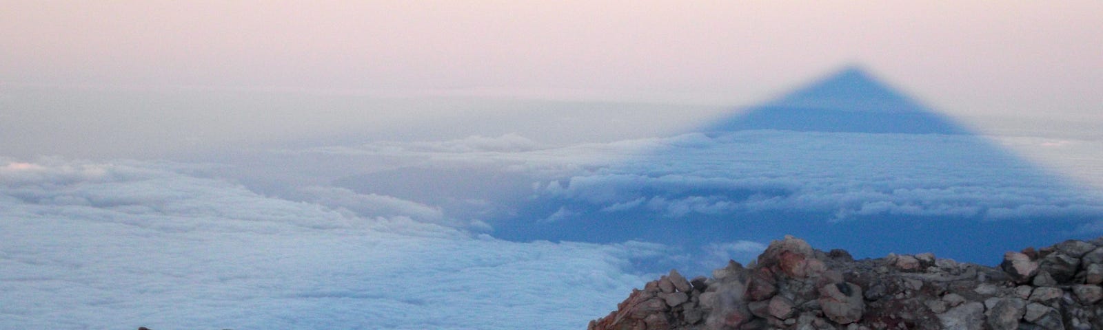 View of the crater and shadow of El Teide just after sunrise.