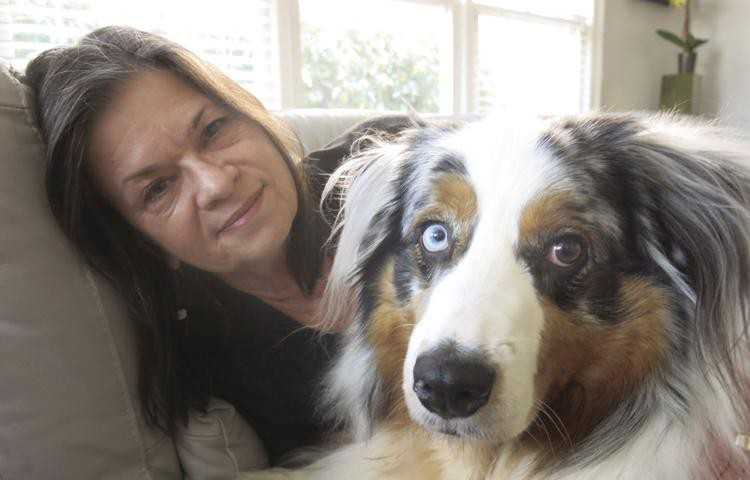 Photo Larry Dingman of Tammy Dingman with their dog Romeo