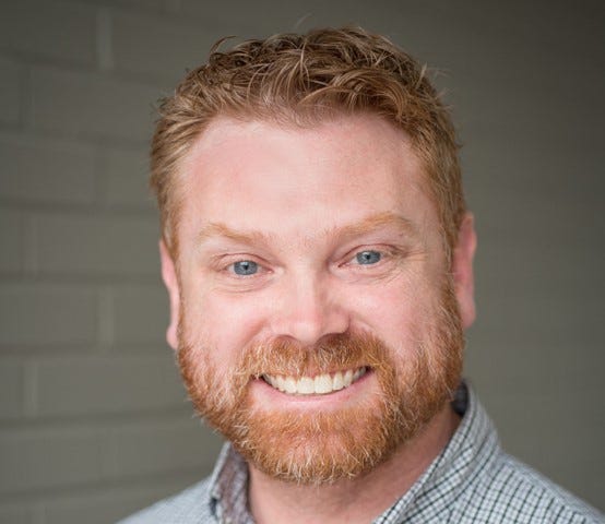 Headshot of John Clack ’05, Faculty of Social Sciences