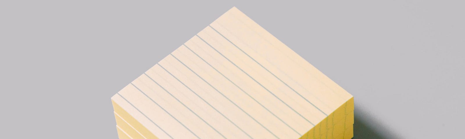 Stack of yellow lined sticky notes