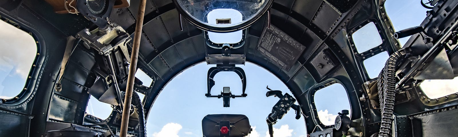 B-17 Cockpit looking out at the sky.