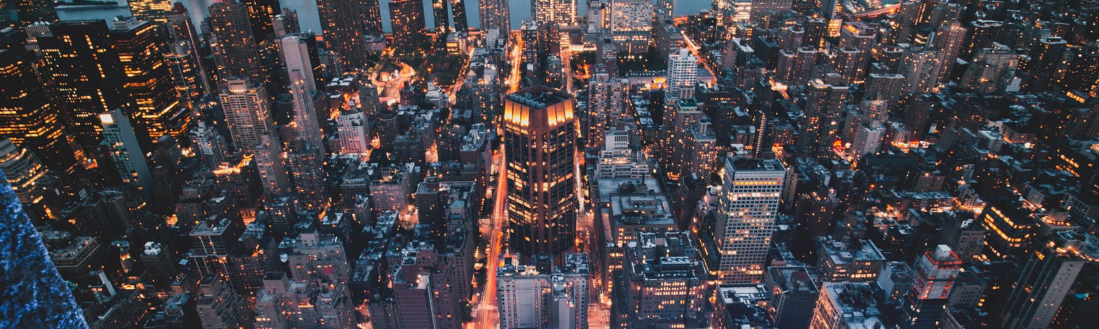 Aerial view of a city lit up at night