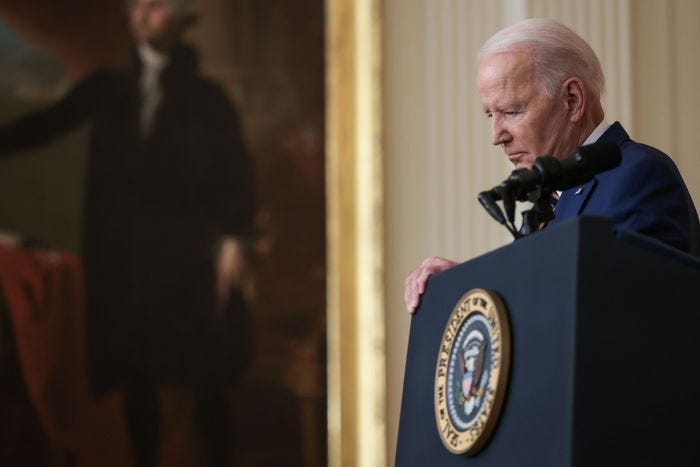 a distressed looking Joe Biden