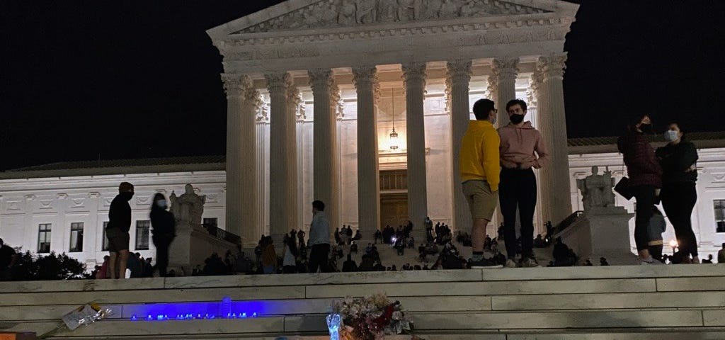 candlelit memorial on Supreme Court steps after Ruth Bader Ginsberg’s passing