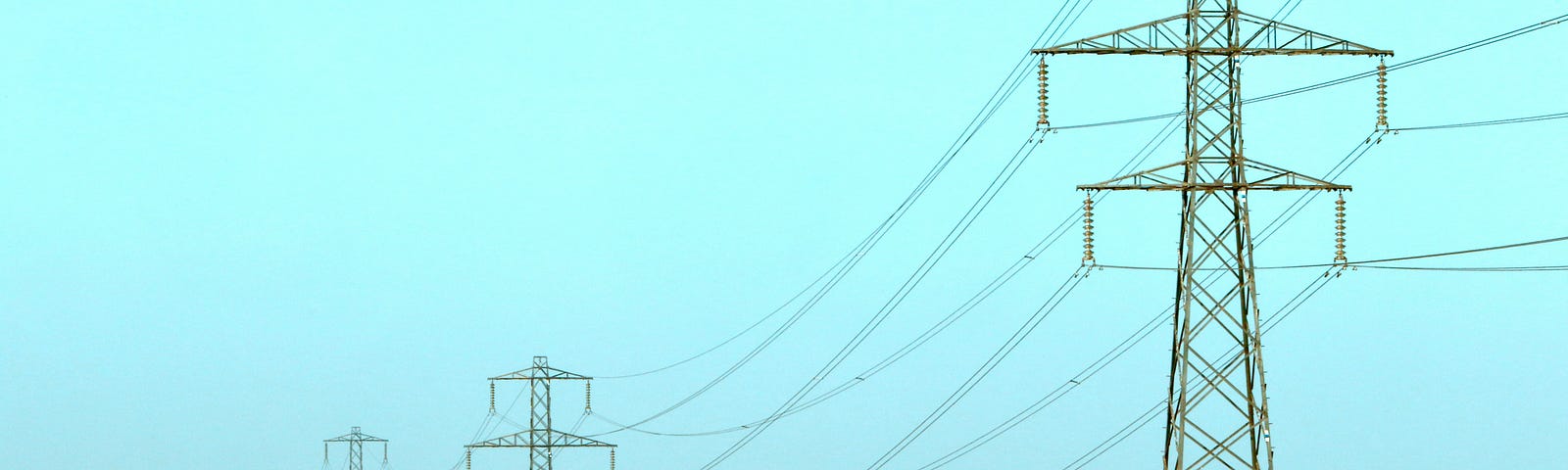 Electricity pylons in open country