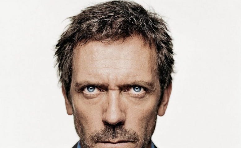 Dr. House stares sternly