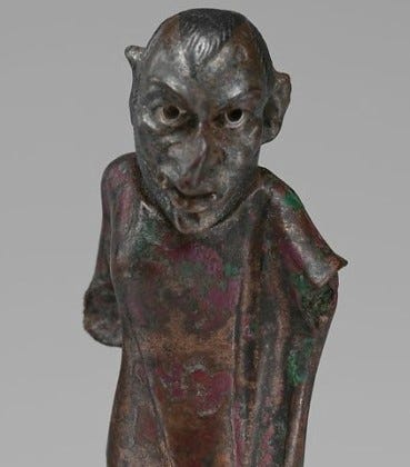 An statue of bronze (Greek 2nd Century B.C. — 1st Century A.D.)