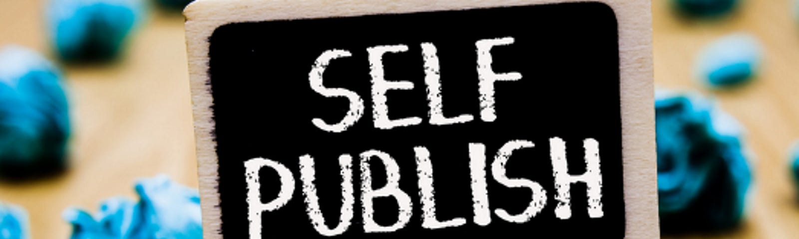 Image of sign that says “self publish”