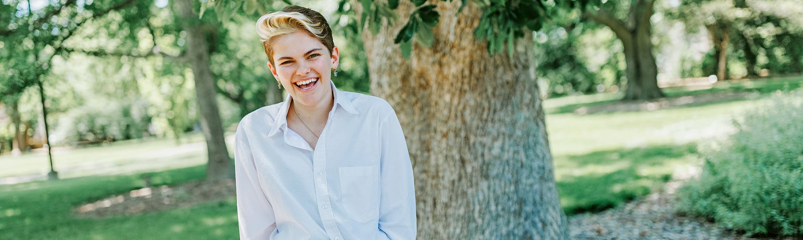 Ally smiles for a photo on East Campus