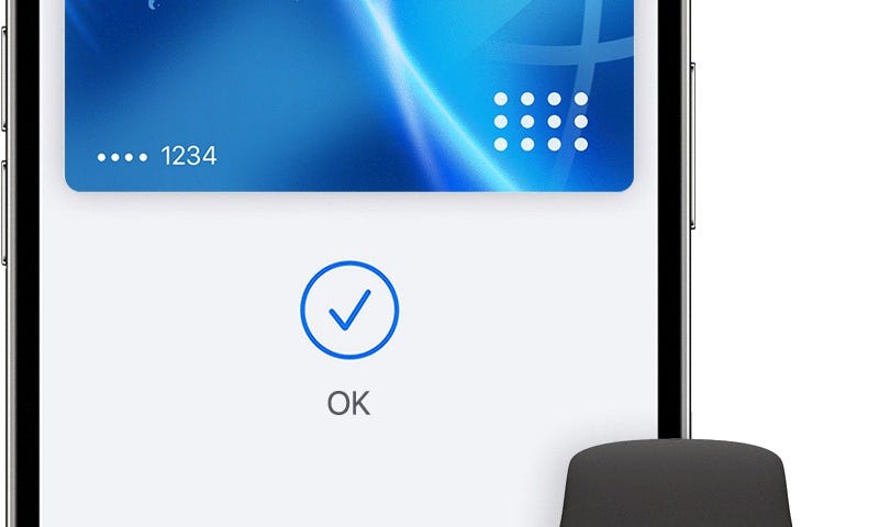 IMAGE: An iPhone and an Apple Watch displaying a credit card to pay with Apple Pay