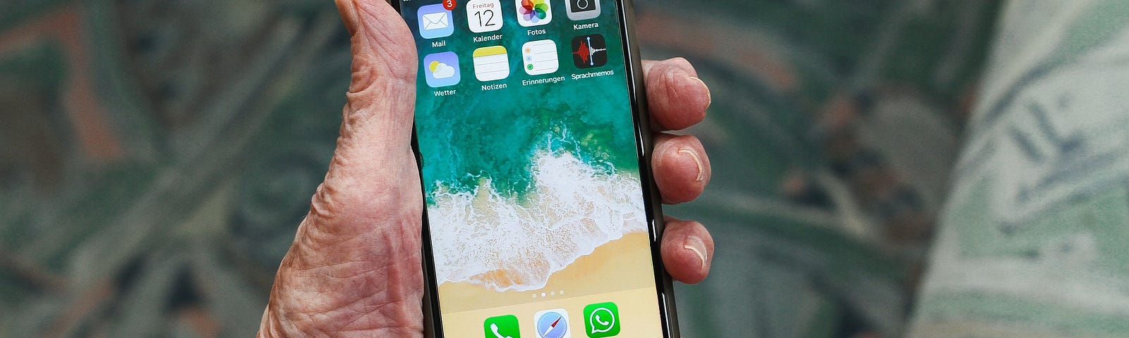 iPhone being held by a senior