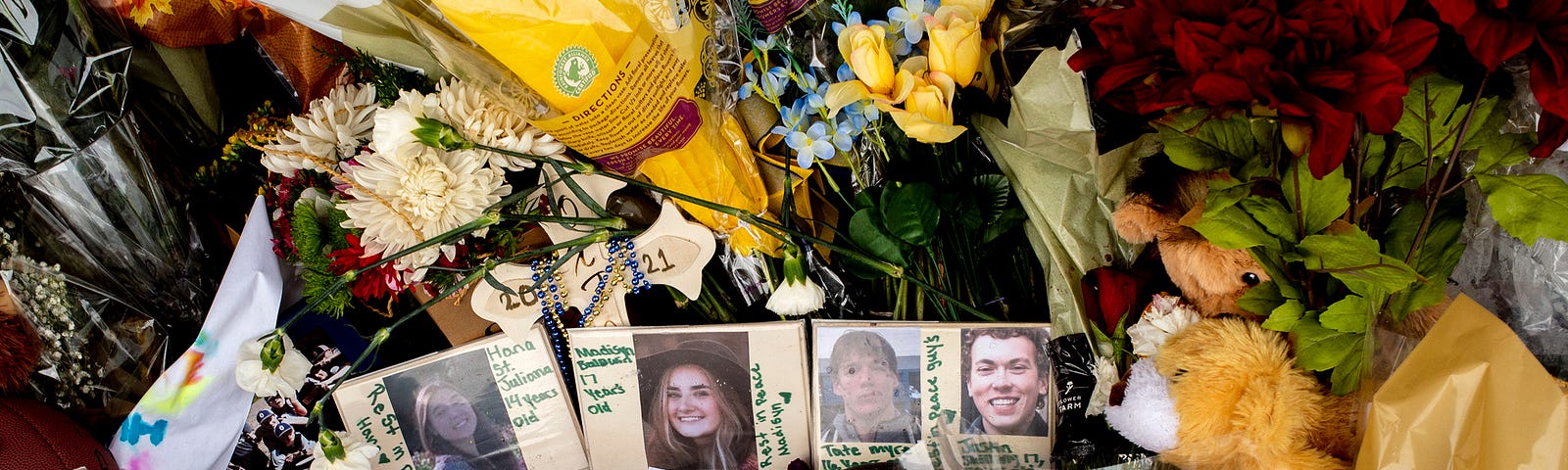 A memorial outside Oxford High School in Oxford, Michigan, after a 15-year-old allegedly killed four classmates and injured seven others on November 30, 2021. Photo by Jake May/The Flint Journal via AP