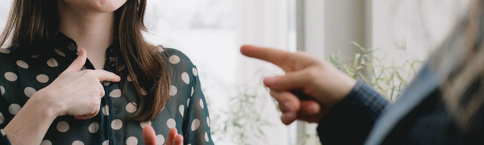 woman at work having a conflict with her lady boss