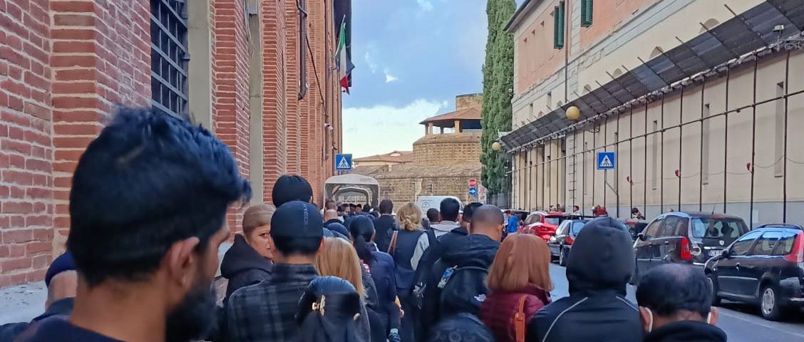 Line outside of the Immigration office, Florence, Italy