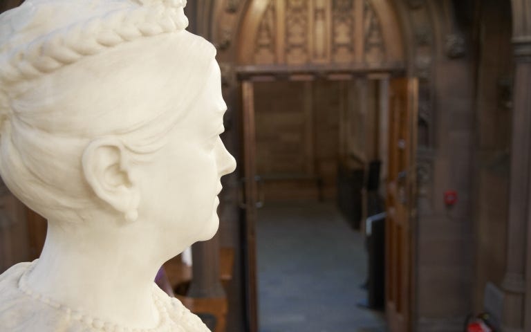 Photograph of the head and shoulders of the Enriqueta Rylands statue located in the Historic Reading Room at the John Rylands