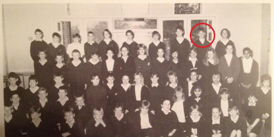 A black and white photo of a school class.