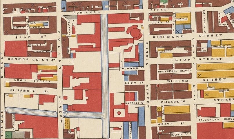 Section of a map of Manchester showing blocks of housing in different colours. The colours represent the age of housing.