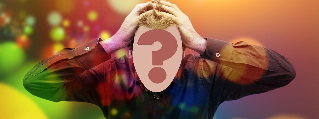 Frantic man with a question mark covering his face (programming error)