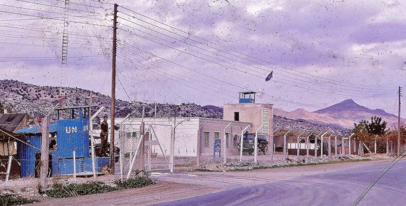 Soldiers of the 3rd Battalion, The Royal Anglian Regiment, British Army, stand guard at the entrance to the U.N. camp at Kophinou village, located between Limassol and Larnaca.