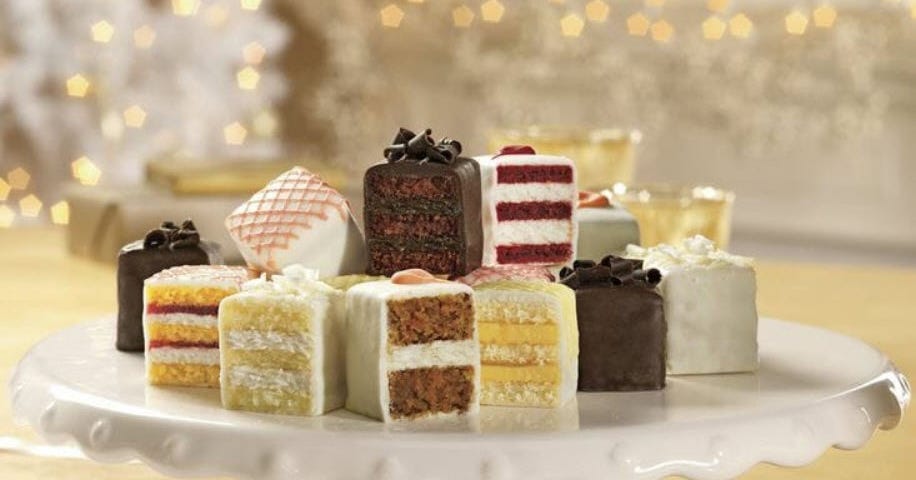 Incredible petits fours in chocolate fudge, red velvet, strawberry, vanilla, carrot spice, and lemon