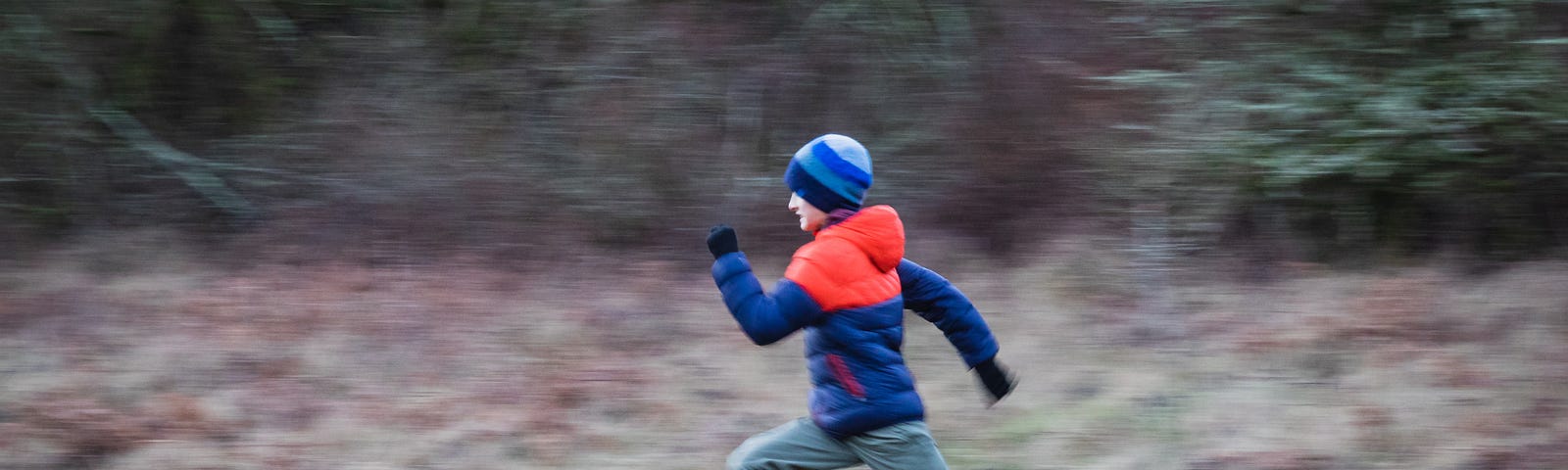 A sprinting boy.