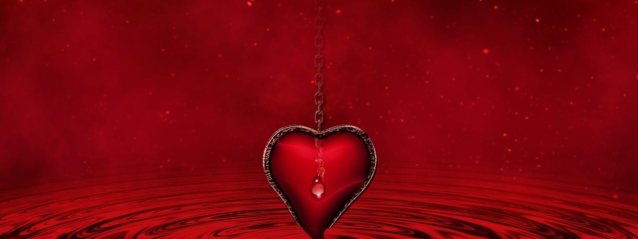 A heart in a pool of blood.