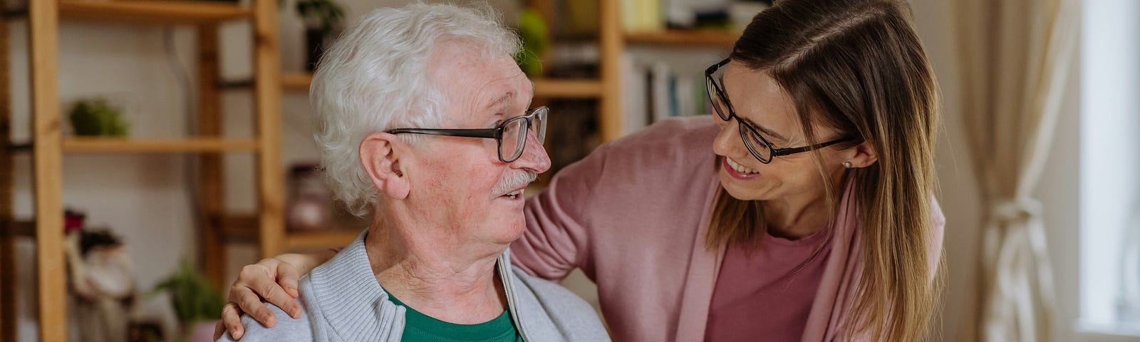 Woman gives elderly man a gift in an act of kindness