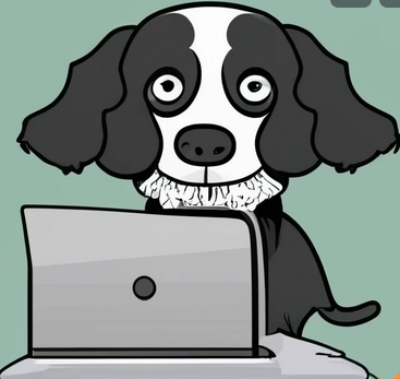 A dog sitting at a computer