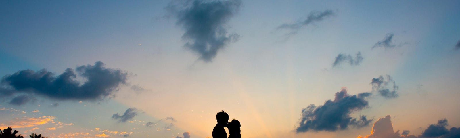 Silhouette of a couple embracing