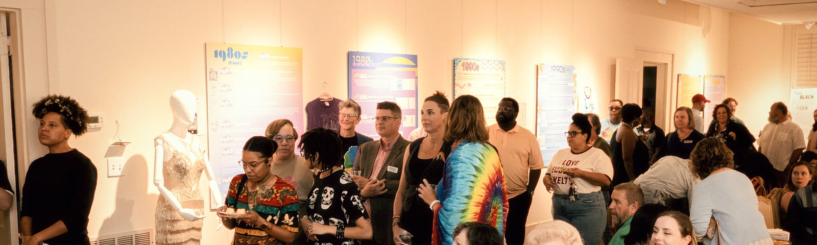 This picture shows a crowd gathered during the opening night of the Magnolia Memories Exhibit.