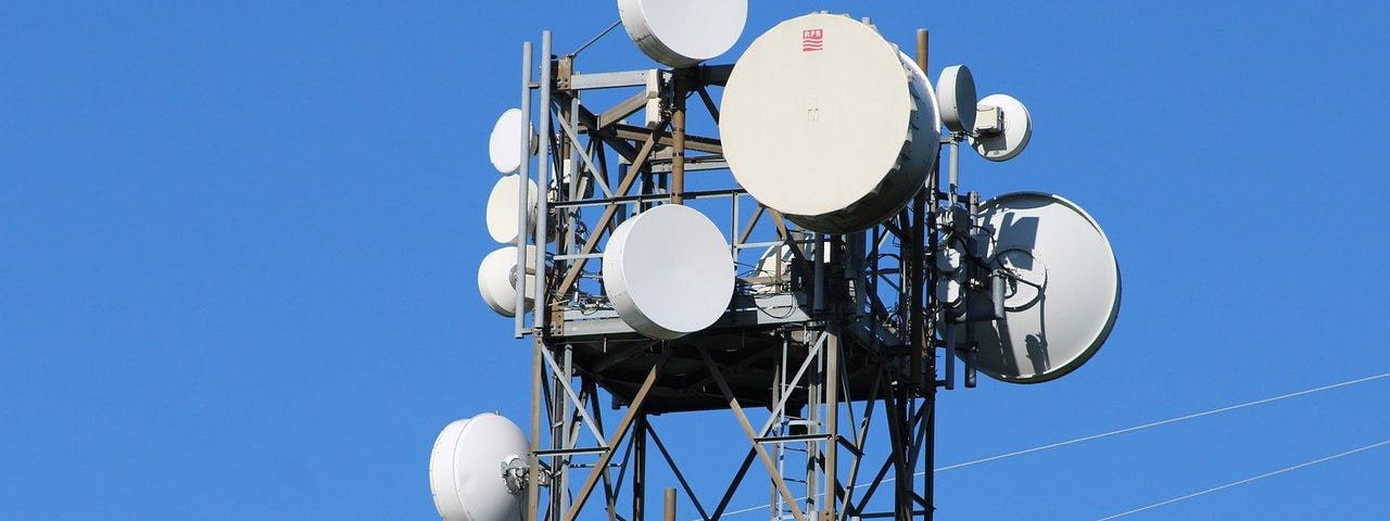 IMAGE: A repeater telecom antenna on a blue sky background