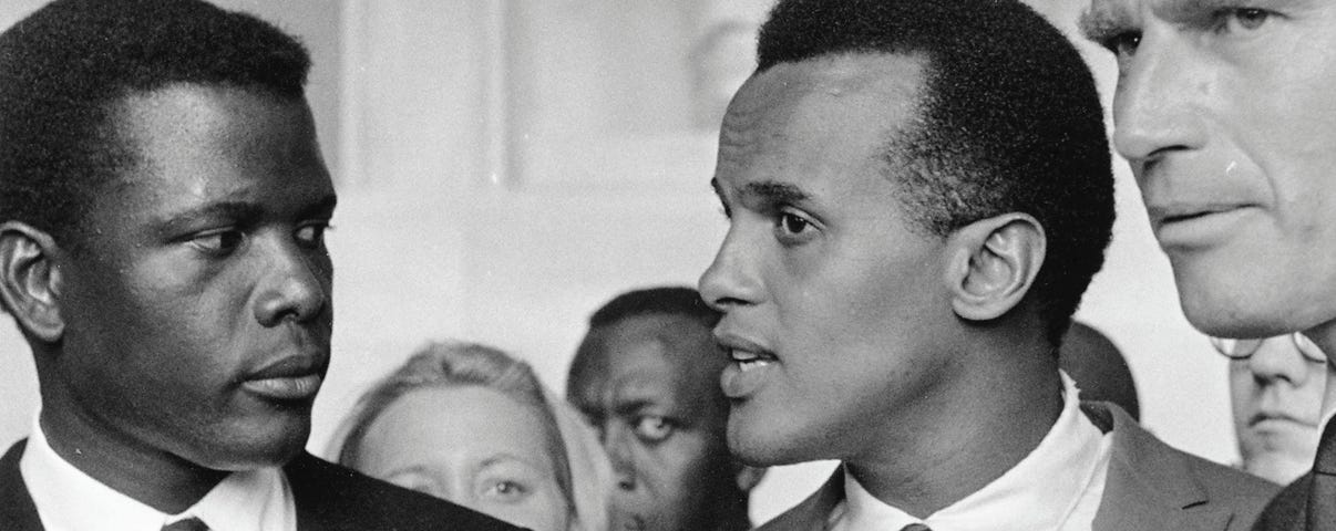 Sidney Poitier at the 1963 March on Washington for Jobs and Freedom, alongside actors Harry Belafonte and Charlton Heston