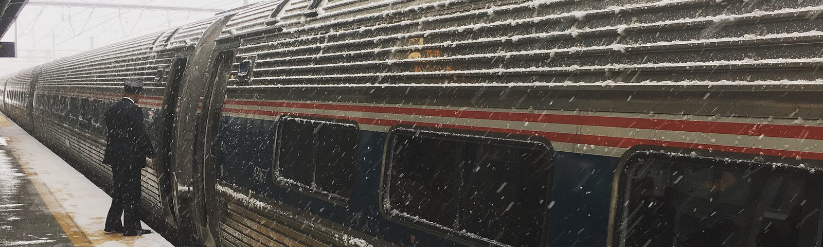 Snowy Amtrak platform.