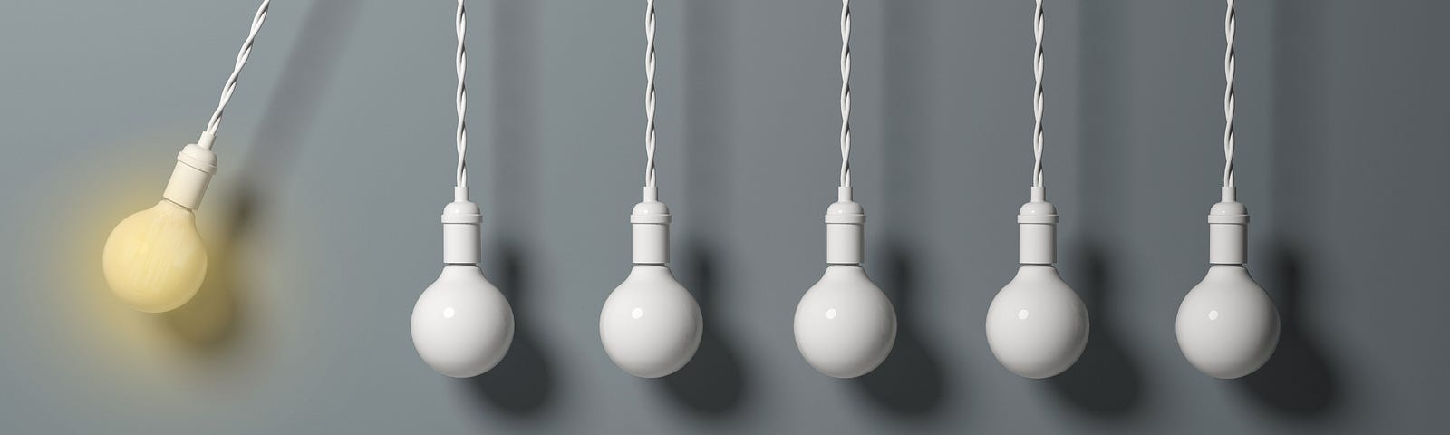 Light bulb as a pendulum, hitting other lightbulbs like in a newton cradle.