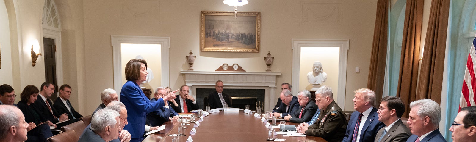 House Speaker Nancy Pelosi stands up in a meeting with President Trump and Congressional leadership Wednesday, Oct. 16, 2019.