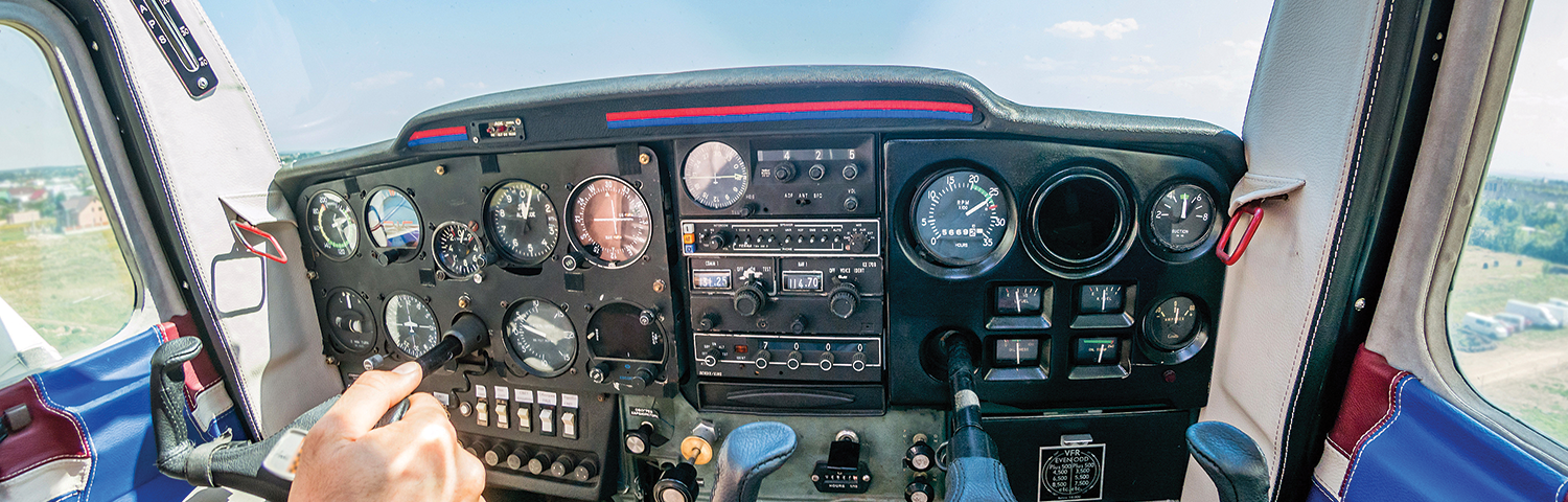 Inside the cockpit of a small airplane.