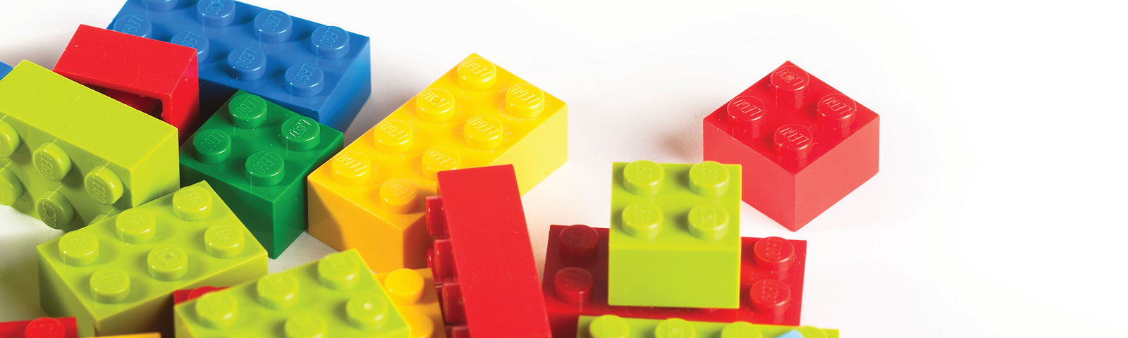 Colorful lego blocks randomly spaced at the bottom of the picture. Copy reads: 5 Surprising Ways to Simplify