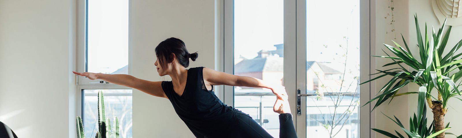 Woman working out in her living room.