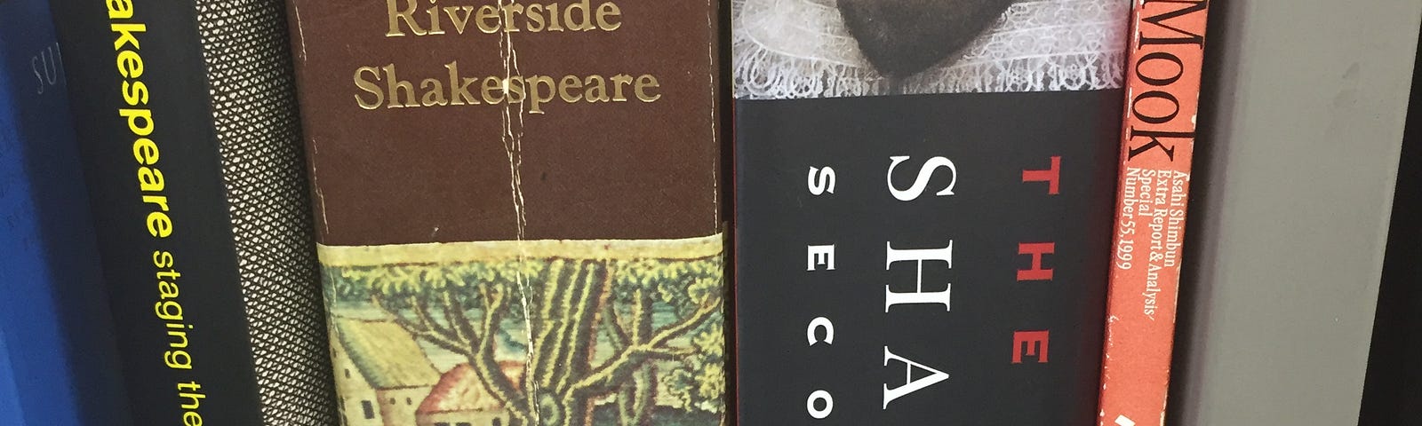 Color photo of several volumes of William Shakespeare’s works on a shelf.