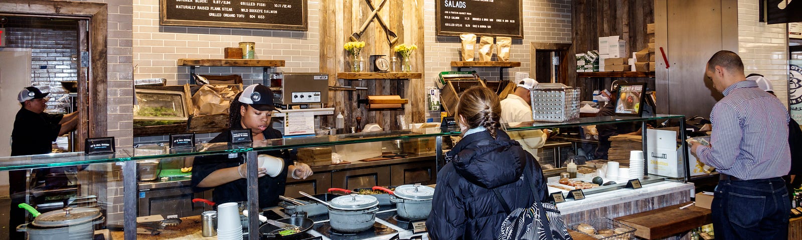 Dig Inn Seasonal Market counter in a shopping center at Brookfield Place.