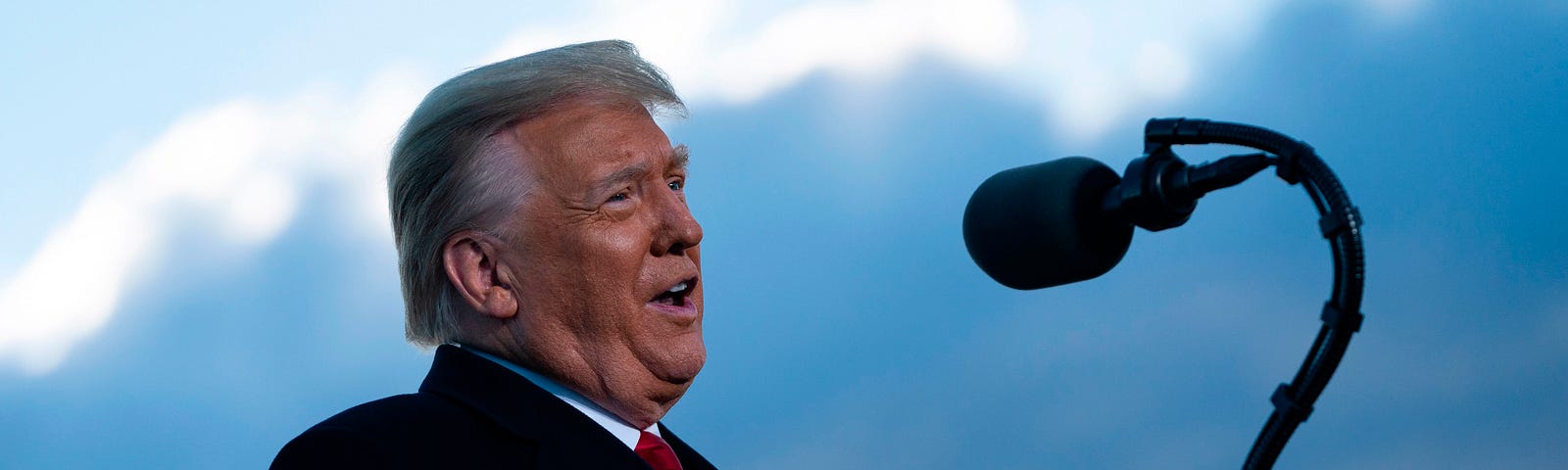 Outgoing president Donald Trump addressing guests from a podium on Jan. 20, 2021.