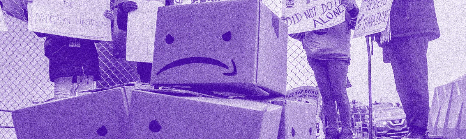 A purple filtered photo of a stack of boxes with an angry Amazon face on them at a protest.