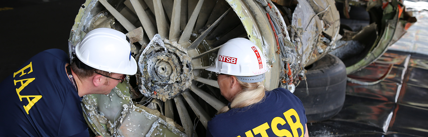 Photo of FAA and NTSB inspectors.