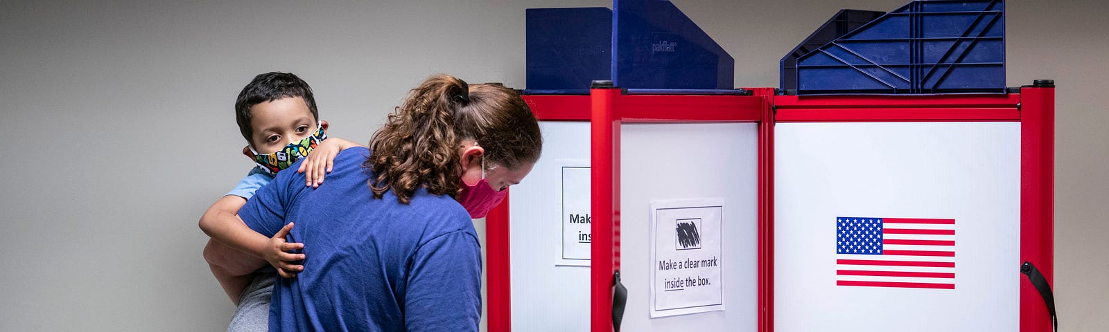 A woman casts her ballot for the 2020 presidential election at an early voting center on Oct. 1, 2020 in Alexandria, Virginia