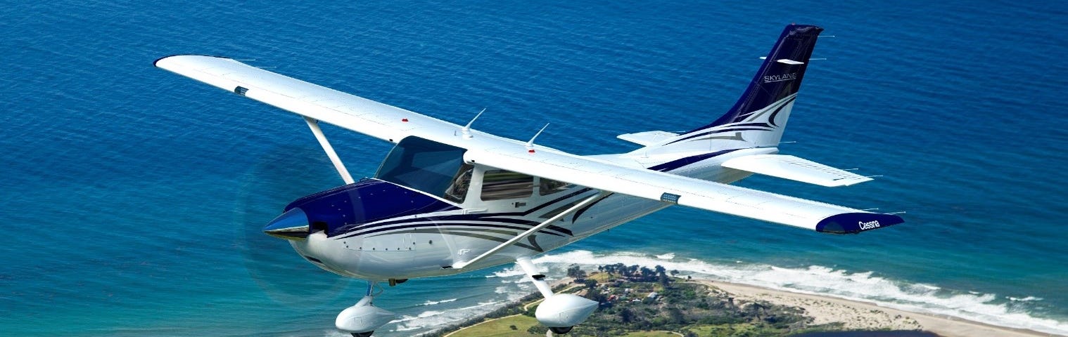 Photo of a Cessna in flight.